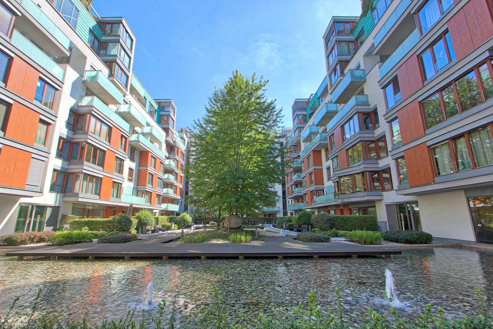 Riverside courtyard with fountains